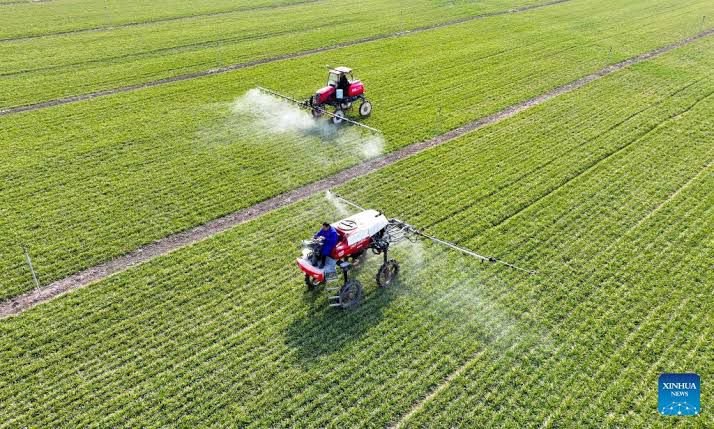 Drone monitoring farmland from above